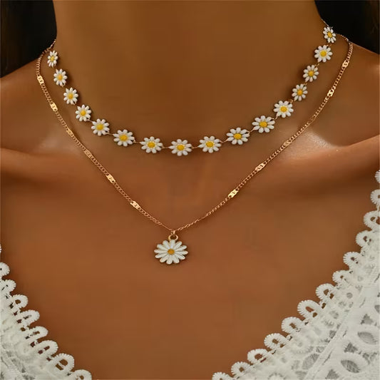A handmade two-piece necklace with a daisy flower